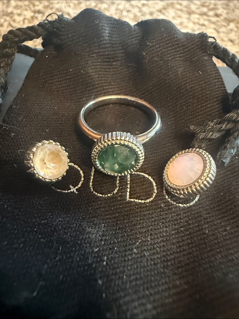 Triple-Accent Silver Ring with Green Center Stone